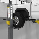 Automotive lift with wheel-mounted tire rack and sliding tire roller for easy use