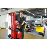 Red Audi on Coats CWA 6000 aligner with yellow panels, black control, diamond mini targets