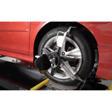 Coats CWA 6500 red wheel alignment tool with silver frame, black rubber grip