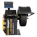 Automotive laser wheel balancer with mounted tire on Ranger LS45DS Laser-Spot 3D wheel balancer