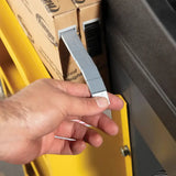 Hand holding adhesive wheel weights for Ranger LS45DS laser wheel balancer setup