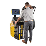 Person using Ranger LS45DS laser wheel balancer for precise tire balancing