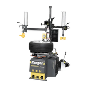 Gray and yellow Ranger R980DP tire changer with mounted tire, featuring pneumatic cylinders and dual assist arms