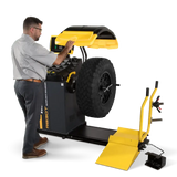 Man using Ranger RB30T digital truck wheel balancer with contactless wheel width measurement