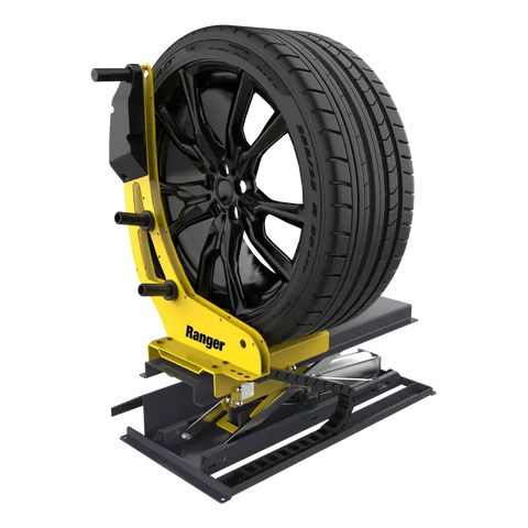 Yellow black Ranger RWL175 tire balancer with lug bolt flange holding black wheel