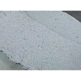 Rema 1 Gal Wear Repair Compound with Hardener on rough gray surface for cold vulcanizing