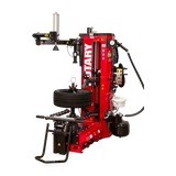 Red tire changer with mounted tire on Rotary R1250 Leverless Tire Changer for R1200 changing