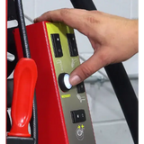 Person’s hand operating Rotary R1250 Leverless Tire Changer control panel with glowing button