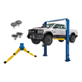 Rotary SPO12-AV lift elevating white pickup with 5in stack adapters