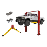 Red and yellow Rotary SPO12-AV lift elevating white pickup with seismic plate